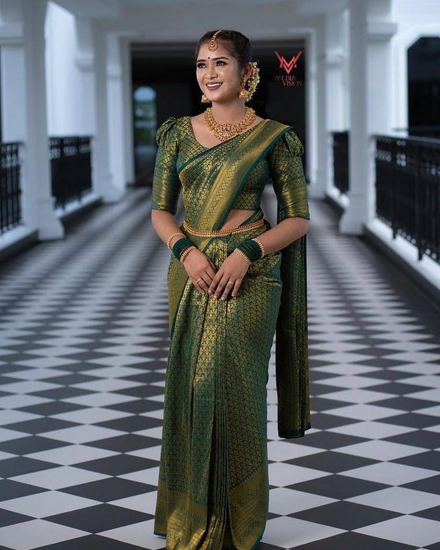 Dark Green Soft Lichi Silk Saree With Zari Weaving Work