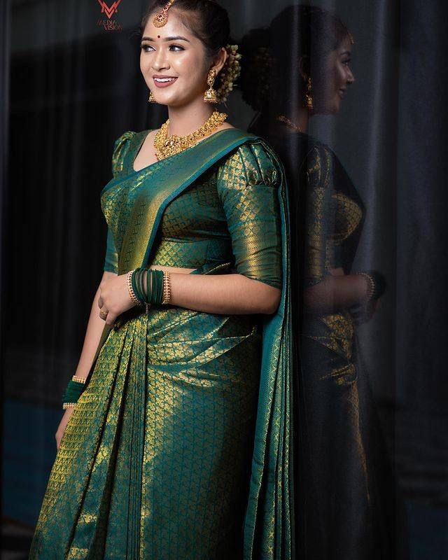 Dark Green Soft Lichi Silk Saree With Zari Weaving Work