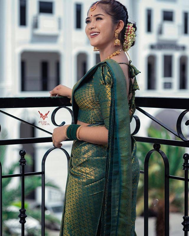 Dark Green Soft Lichi Silk Saree With Zari Weaving Work